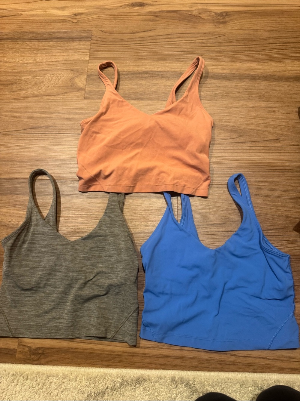 lululemon athletica Tank Tops in Rust, Heather Gray, and Bright Blue